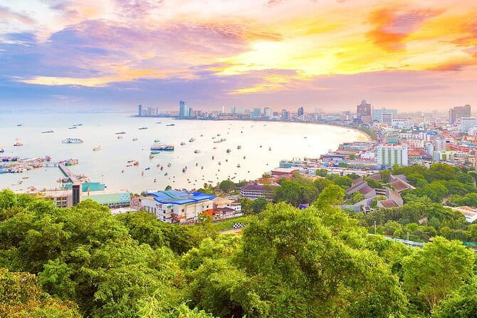 Sunset Party with Island Hopping by Catamaran from Pattaya - Cruising time and the spirit house stretch toward Monkey Island